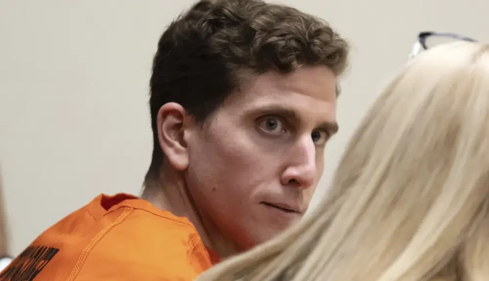 Bryan Kohberger, left, looks toward his attorney, public defender Anne Taylor, right, during a hearing in Latah County District Court, Jan. 5, 2023, in Moscow, Idaho. A grand jury has indicted Kohberger on the charges in the University of Idaho slayings case. (AP Photo/Ted S. Warren, Pool, File)