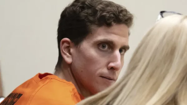 Bryan Kohberger, left, looks toward his attorney, public defender Anne Taylor, right, during a hearing in Latah County District Court, Jan. 5, 2023, in Moscow, Idaho. A grand jury has indicted Kohberger on the charges in the University of Idaho slayings case. (AP Photo/Ted S. Warren, Pool, File)